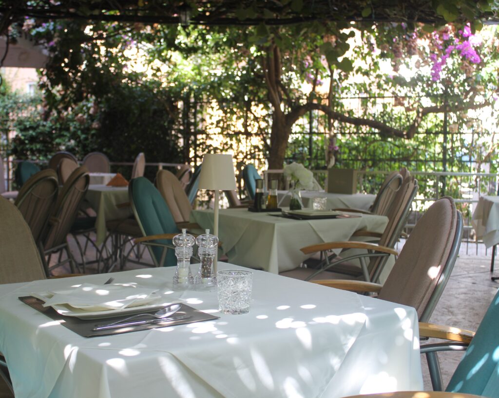 restaurant tables outside in a garden