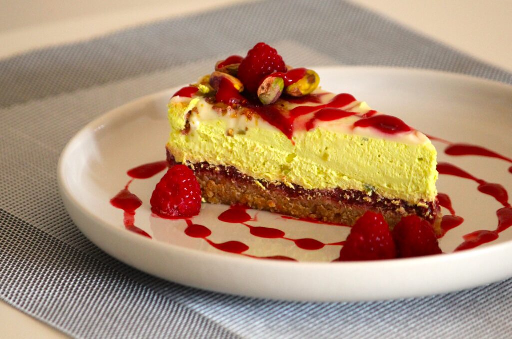 raspberry-cheesecake served on a plate