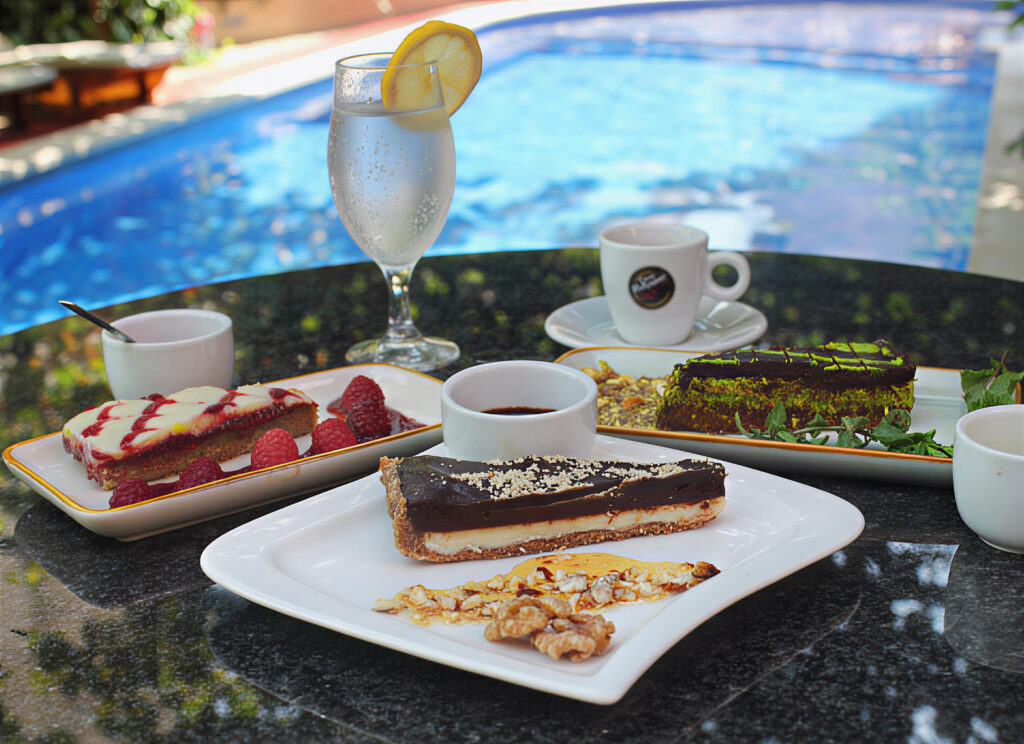 desserts served at the table by the pool