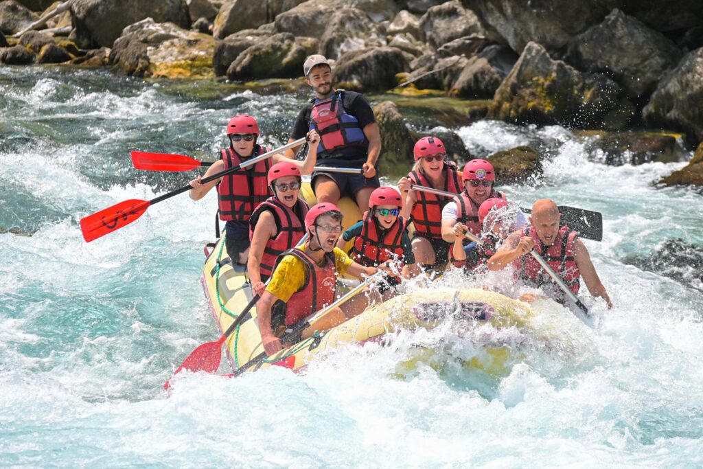 people in a boat on rafting