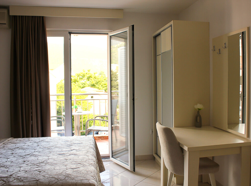 hotel room interior with a balcony