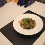 steak risotto served