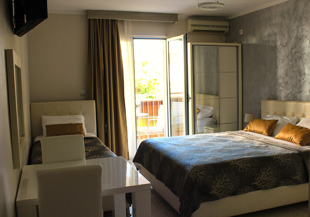 interior of a hotel room with balcony