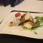 stuffed chicken breasts served